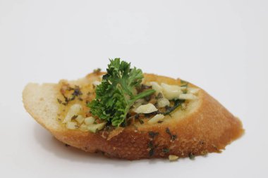Sarımsaklı ekmek, baget, üstüne sarımsaklı tereyağı ve maydanozlu Fransız ekmeği.