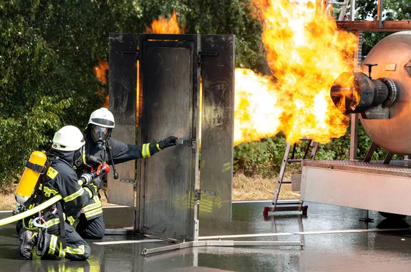 Firefighters Firefighting Training Exercise Stock Picture