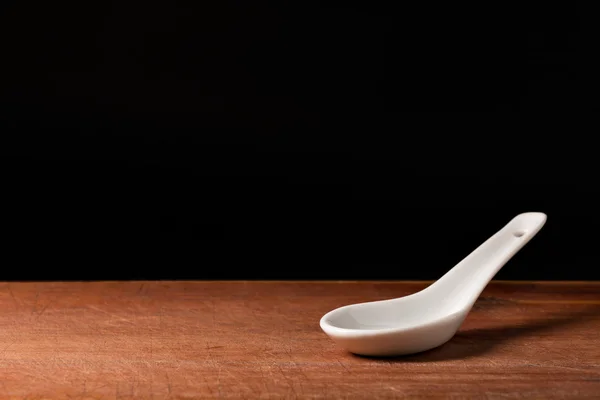 White porcelain spoon — Stock Photo, Image