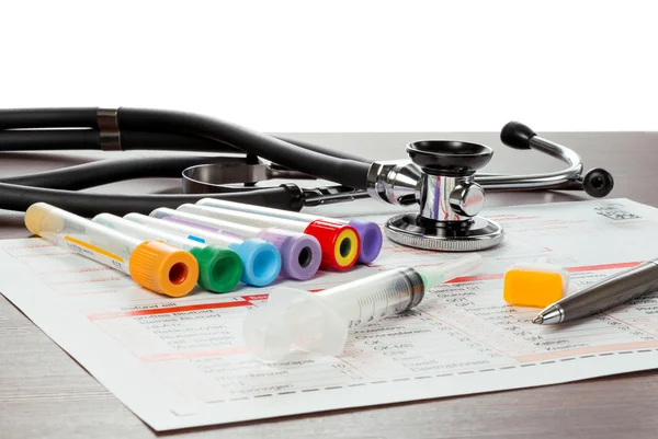 Laboratory paper and utensils for blood test — Stock Photo, Image