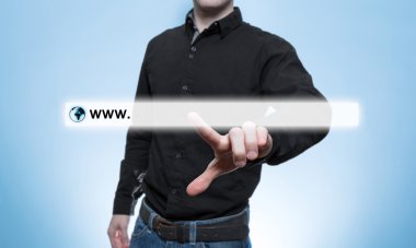 Young man touches a virtual Web browser