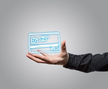 Man holding a credit card symbol clipart