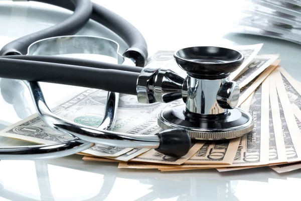 Dollar bills with stethoscope — Stock Photo, Image