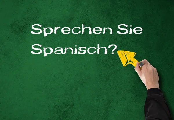 Homem escreve, você fala espanhol, em uma parede — Fotografia de Stock
