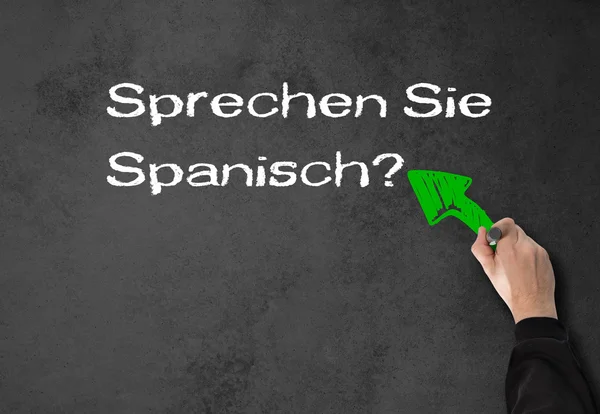 Ember írja, beszél spanyol a falon — Stock Fotó