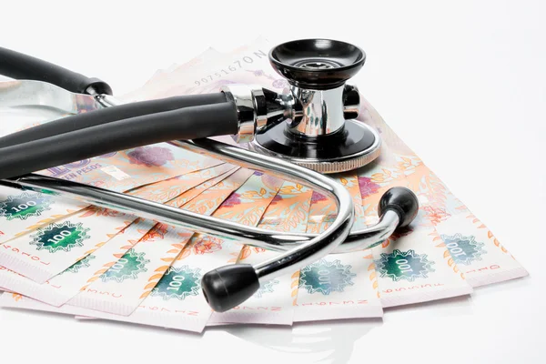 Dollar bills with stethoscope — Stock Photo, Image