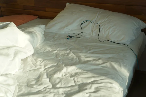 morning bed early wakeup awake messy earbud concept