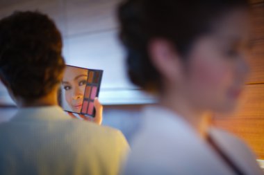 Woman makeup dress mirror Beautiful smile teen concept