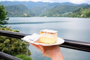 vanilla and custard cream cake on Bled lake - symbol clipart
