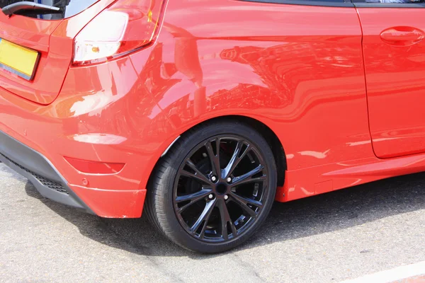 Back of the sport car with a black wheel — Stock Photo, Image