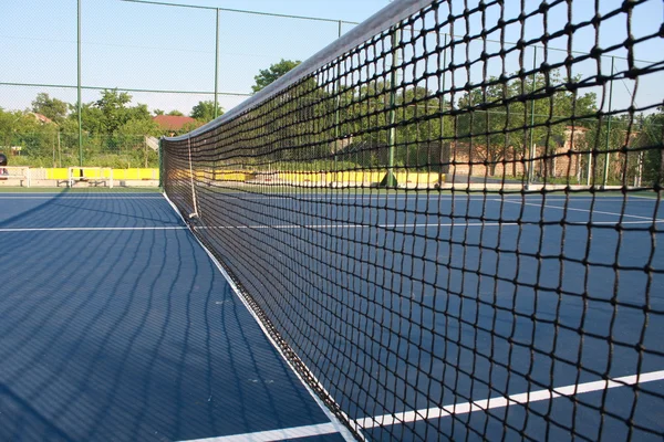 Pista de tenis con suelo azul . —  Fotos de Stock