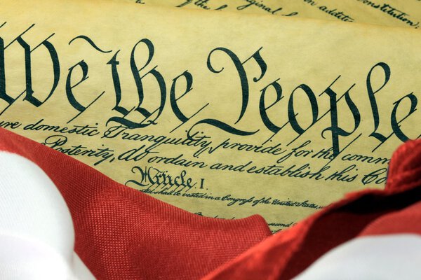 Historical Document US Constitution - We The People with American Flag