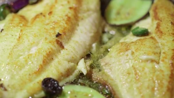 Cooking fish fillet in frying pan — Stock Video