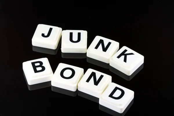 Αυτός λέξη junk bond - Α όρος χρησιμοποιείται για την ΕΠΙΧΕΙΡΗΣΗ στη χρηματοοικονομική και διαπραγμάτευσης στο χρηματιστήριο — Φωτογραφία Αρχείου