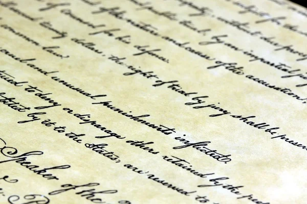 Oud papier met het schrijven van kalligrafische handschrift — Stockfoto