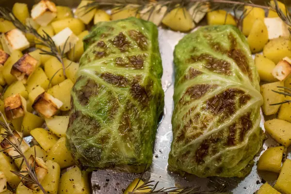 Finely seasoned lamb fillet wrapped in savoy cabbage leaves — Stock Image Finely Seasoned Lamb Fillet Wrapped Savoy Cabbage Leaves Stock Photo