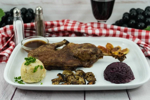 stock image Baked Duck with red cabbage and forest mushrooms