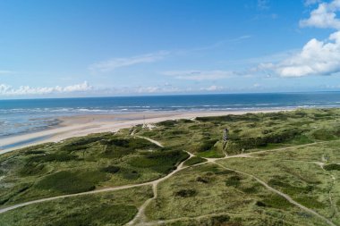 Blavand Danimarka 'nın kuzey denizindeki uçsuz bucaksız plajın izleri.