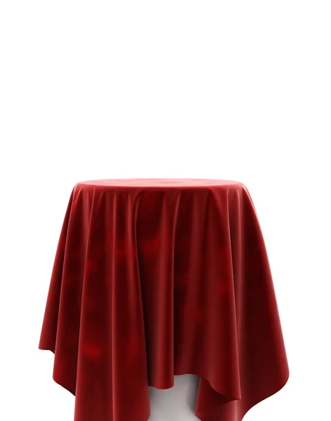 Tissu velours rouge sur un piédestal rond isolé — Photo