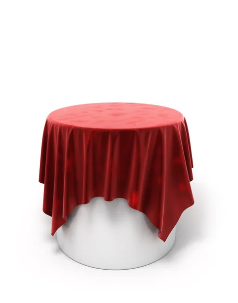Tela de terciopelo rojo sobre un pedestal redondo aislado en blanco — Foto de Stock
