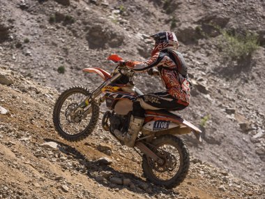 Motorbike driving uphill