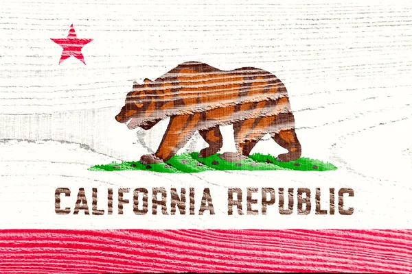 Bandeira da Califórnia pintada sobre fundo de madeira grungy — Fotografia de Stock