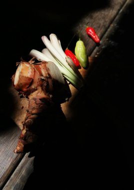 Lemon grass with some others spice on the brown wooden table