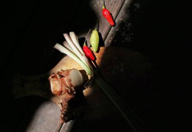Lemon grass with some others spice on the brown wooden table