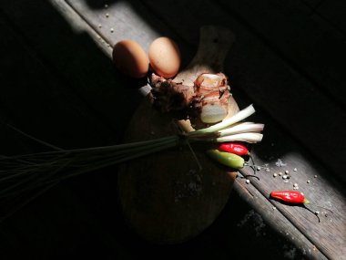 Lemon grass with some others spice on the brown wooden table