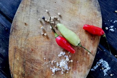 Chili pepper placed on the wooden table