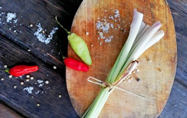 Lemon grass with some others spice on the brown wooden table