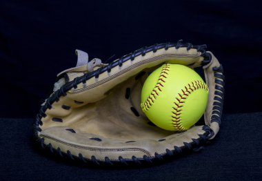 Fastpitch Softball Glove With Yellow Ball clipart