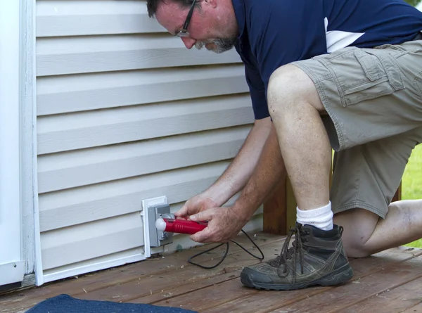 Electrician Testing A Outside Outlet — Stock Photo, Image