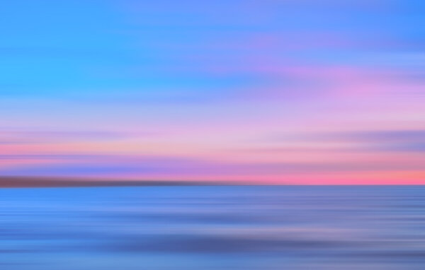 Abstract motion blurred colored sea background