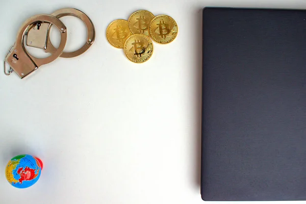 White Table Edge Gray Laptop Handcuffs Bitcoin Coins Globe Copy — Stock Photo, Image
