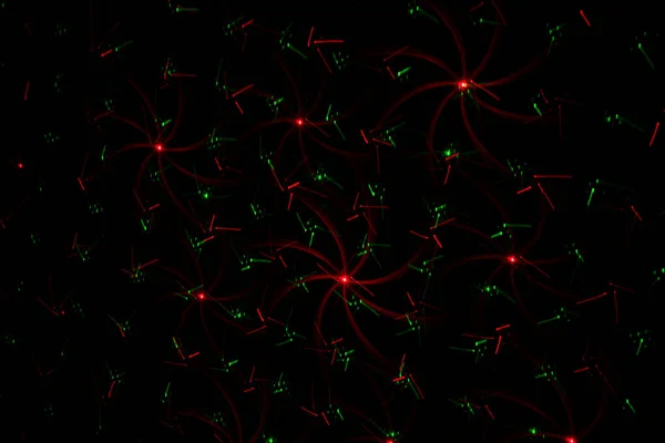 壁に赤と緑のパターン レーザー背景 パーティーやディスコのコンセプト — ストック写真