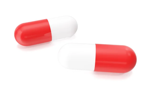 Twee close-up pil capsules geïsoleerd op wit. 3D-illustratie — Stockfoto