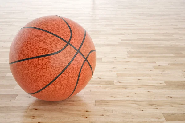 Pallone da basket sul pavimento in legno. — Foto Stock