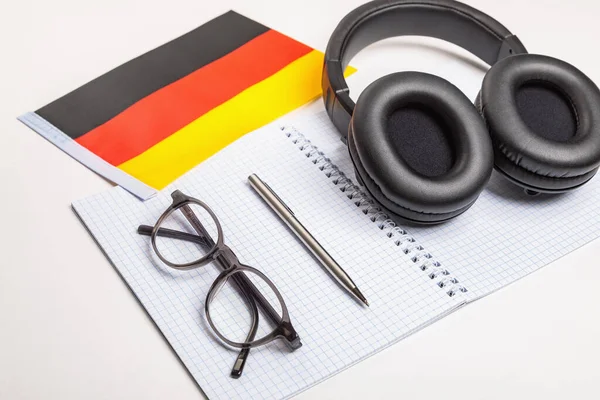 Learning foreign languages in Germany with audio recordings and headphones