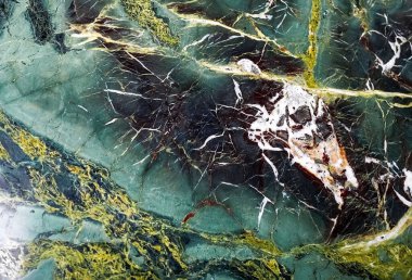 Verimsiz yeşil taş dokusu. İnşaat, bina kaplaması.