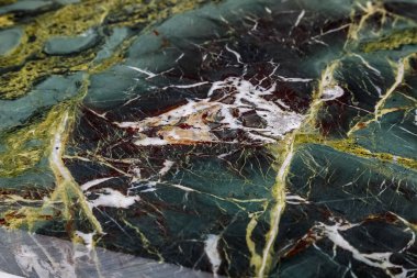 Verimsiz yeşil taş dokusu. İnşaat, bina kaplaması.