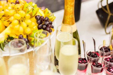 Buffet with a dessert of sweets and drinks to celebrate the New Year. Laid banquet table.