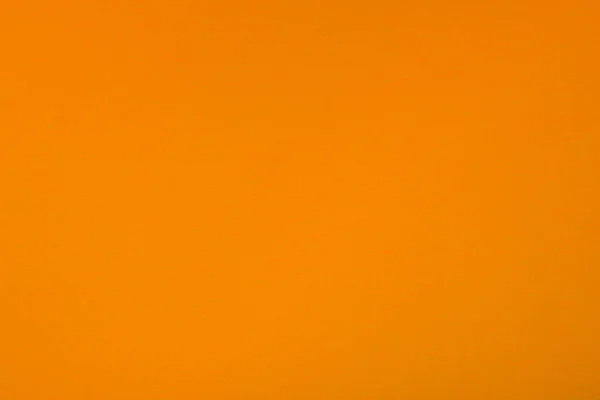 Orange bakgrund med papper struktur, horisontellt, tomt utrymme — Stockfoto