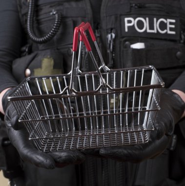 Concept of shoplifting police with a shopping basket clipart