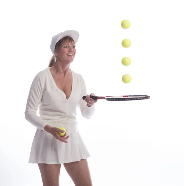 Mulher jogador de tênis com raquete e bolas — Fotografia de Stock