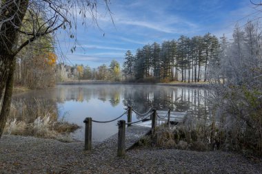 Walpole, New Hampshire, USA. 2020. An early Winter scene from the edge of a lake in New Hampshire, USA. clipart