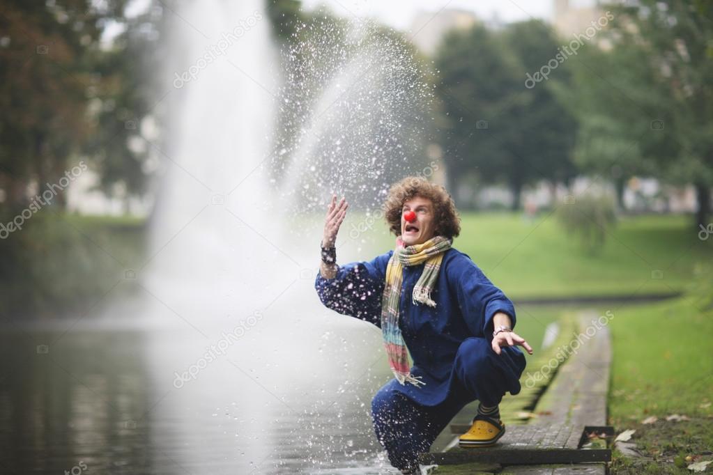 Street performance of single clown