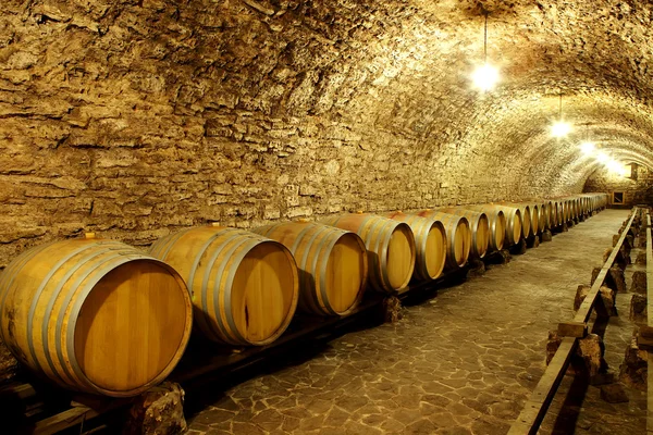 Old cellar of the winery Barrels of wine in the future Huge ware Stock Photo