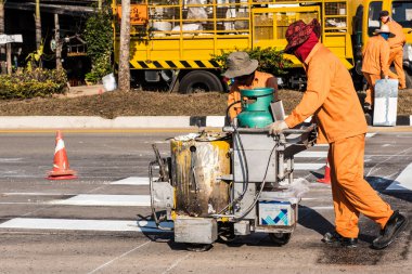 Road Marking Workers at Work. clipart