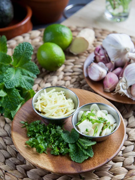 Sliced garlic and ginger.  Asian cuisine delicious ingredients on the kitchen worktop, natural healing with foods which have anti-inflammatory and curing properties.